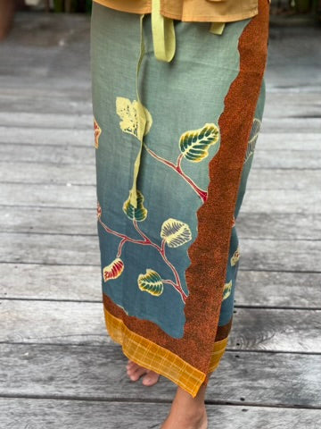 
            
                Load image into Gallery viewer, Daun Jati Linen Sarung Ikat (Greenish-Blue &amp;amp; Brown)
            
        