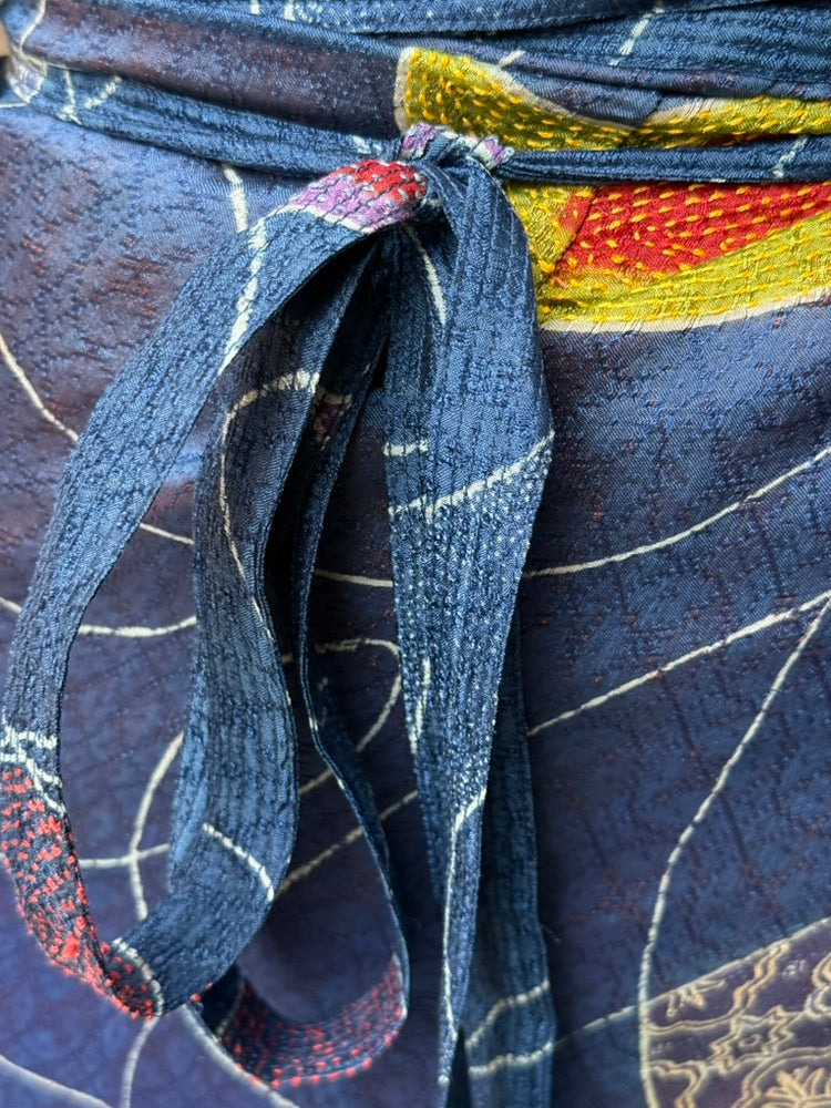 
            
                Load image into Gallery viewer, Benang Kusut Silk Sarung Ikat (Blue &amp;amp; Orange)
            
        