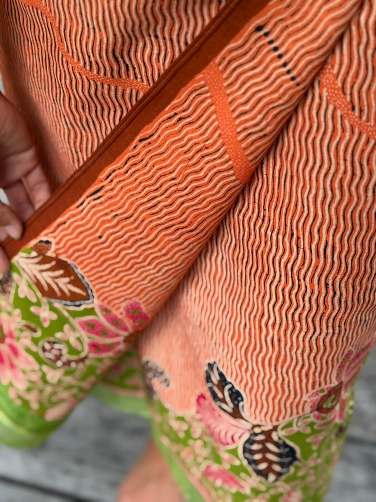 
            
                Load image into Gallery viewer, Bunga Lurik Cotton Sarung Ikat (Orange &amp;amp; Green)
            
        