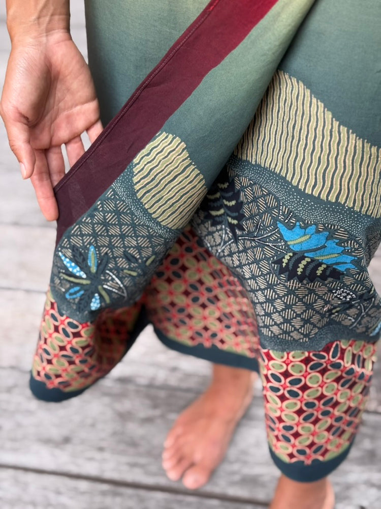 
            
                Load image into Gallery viewer, Kawung Batu Karang Cotton Sarung Ikat (Brown, Green &amp;amp; Teal)
            
        