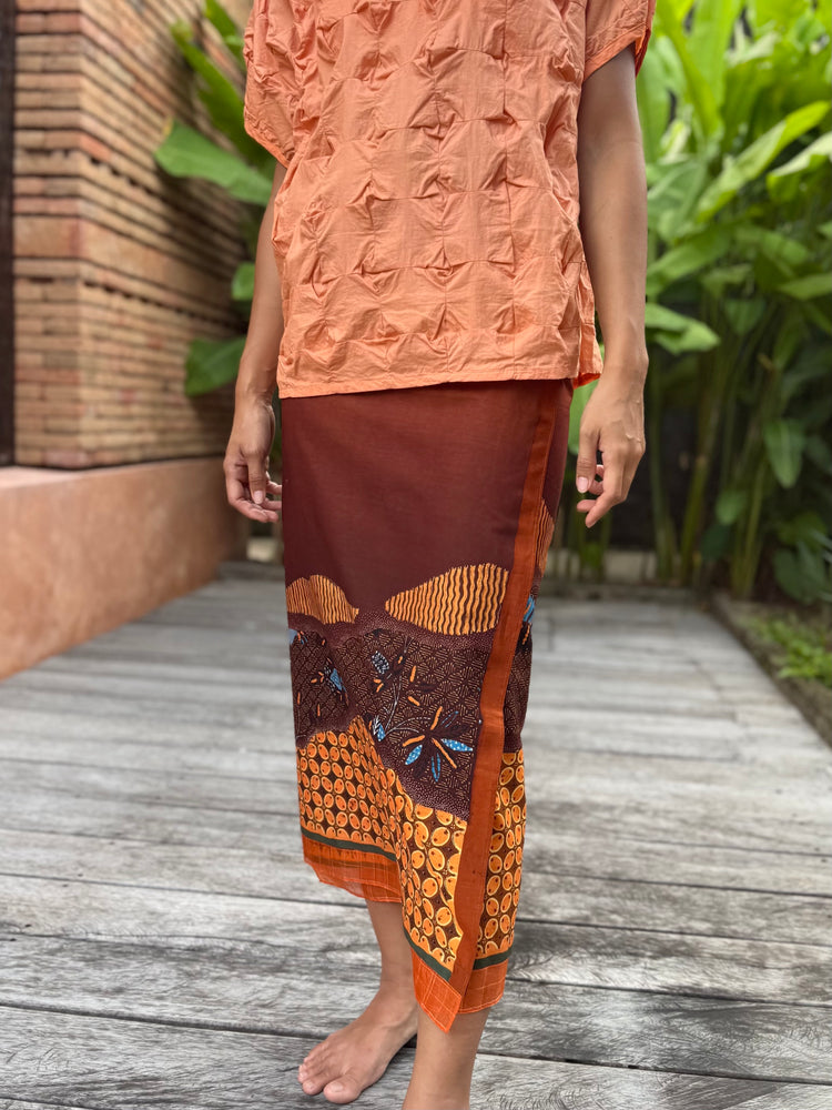 Kawung Batu Karang Cotton Sarung Ikat (Brown & Orange)
